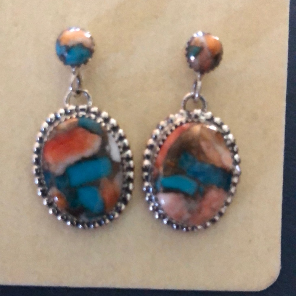 Woman’s turquoise earrings